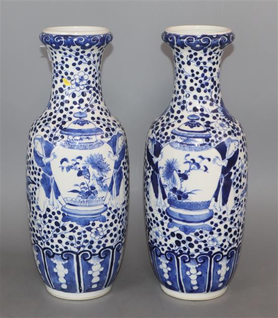 A pair of 19th century Chinese blue and white vases height 30cm